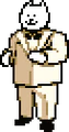 A statue of the Annoying Dog in a suit from the Dog Casino.